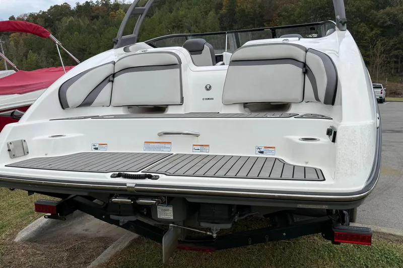 Slide: The Image of 2019 Yamaha Boats AR240 rear view, showcasing swim platform and seating. - 3