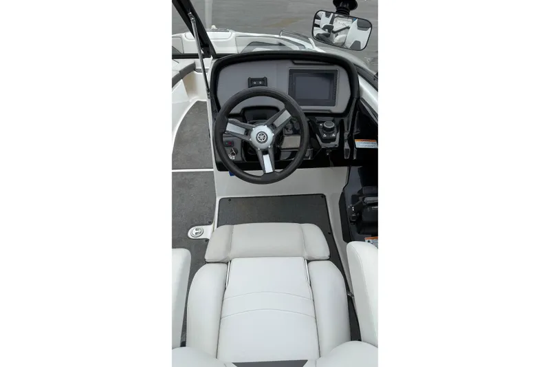 Slide: The Image of 2019 Yamaha Boats AR240 cockpit with steering wheel and dashboard controls. - 5