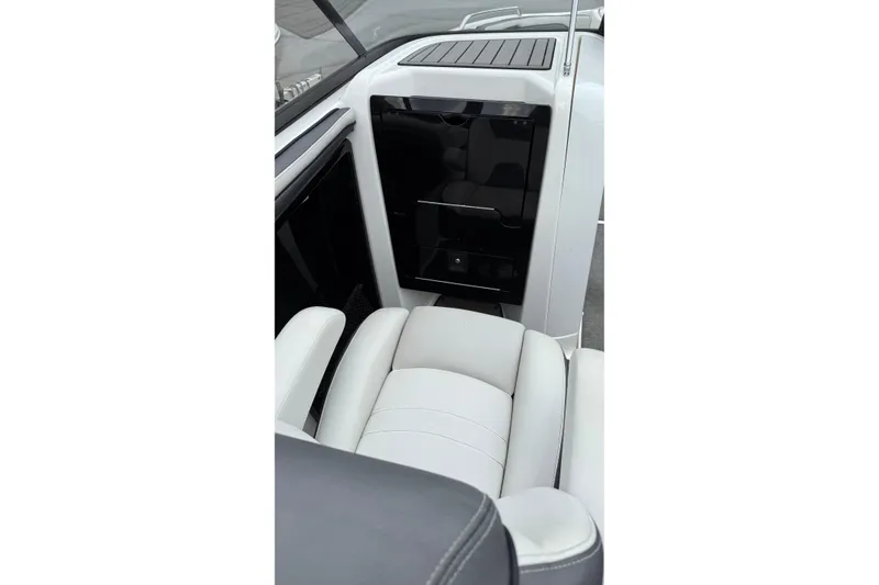 Slide: The Image of Interior view of 2019 Yamaha AR240 boat, featuring sleek seating and modern design elements. - 6