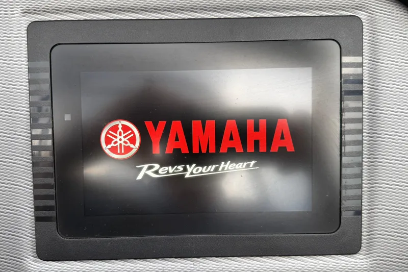 Slide: The Image of Yamaha Boats AR240 2019 dashboard display with logo and "Revs Your Heart" slogan. - 9