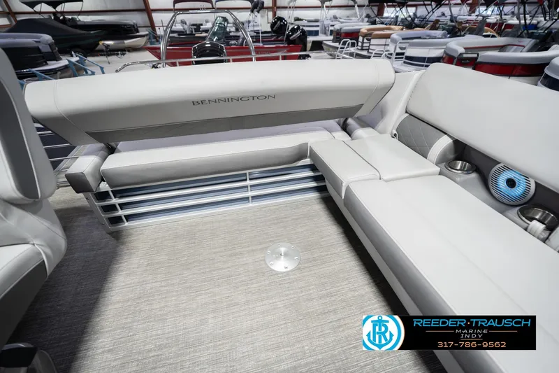 Slide: The Image of 2024 Bennington 23 LSB pontoon boat interior with luxurious seating and modern design. - 31