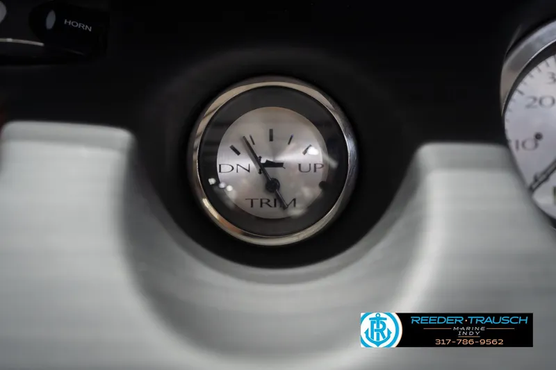 Slide: The Image of 2024 Bennington 23 LSB trim gauge with Reeder-Trausch Marine logo. - 38