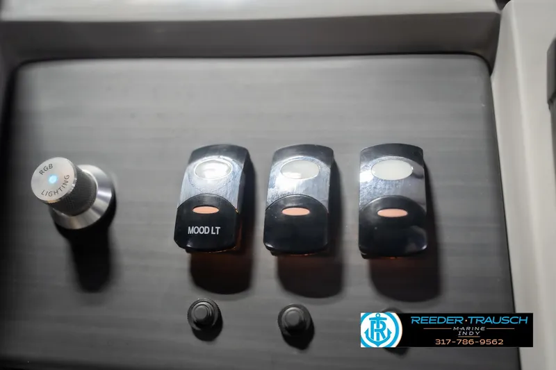 Slide: The Image of Control panel of 2024 Bennington 23 LSB with RGB lighting and mood light switches. - 42