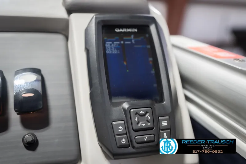 Slide: The Image of Garmin display on 2024 Bennington 23 LSB boat dashboard with control buttons. - 43