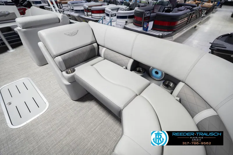 Slide: The Image of Luxurious seating on 2024 Bennington 23 LSB pontoon boat, featuring elegant design and cup holders. - 50