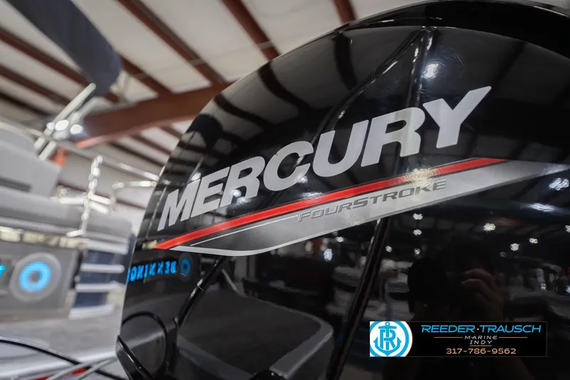 Slide: The Image of 2024 Bennington 23 LSB with Mercury FourStroke engine in showroom. - 56