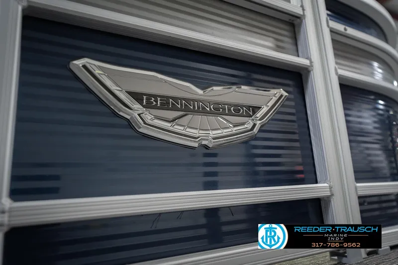 Slide: The Image of 2024 Bennington 23 LSB boat emblem with Reeder-Trausch Marine contact details. - 60