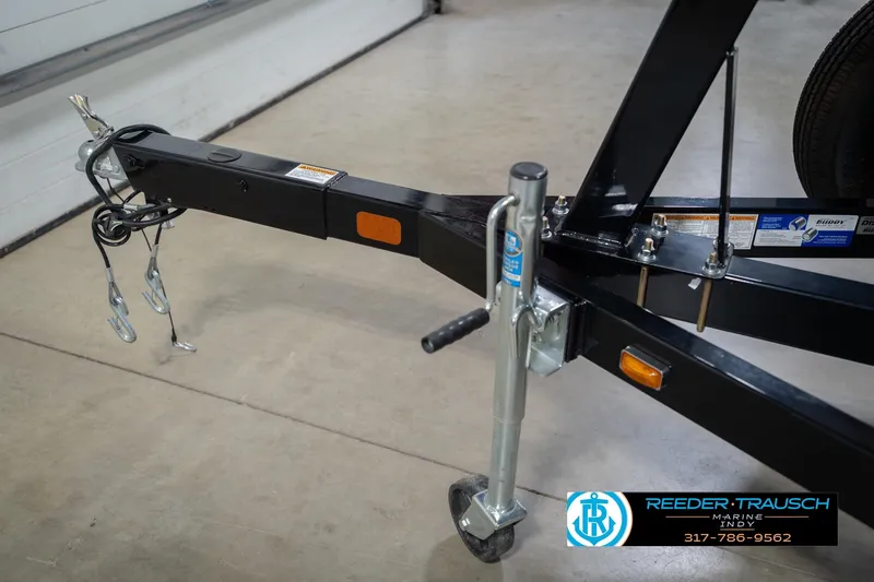 Slide: The Image of Trailer hitch and jack of 2024 Bennington 23 LSB boat, Reeder Trausch Marine logo visible. - 66