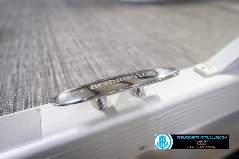 Slide: The Image of 2024 Bennington 23 LSB boat cleat with Reeder-Trausch Marine logo. - 69