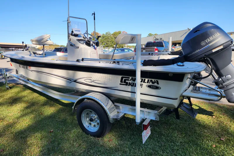 Slide: The Image of 2018 Carolina Skiff 18 JVX CC boat with Yamaha outboard motor on trailer. - 4