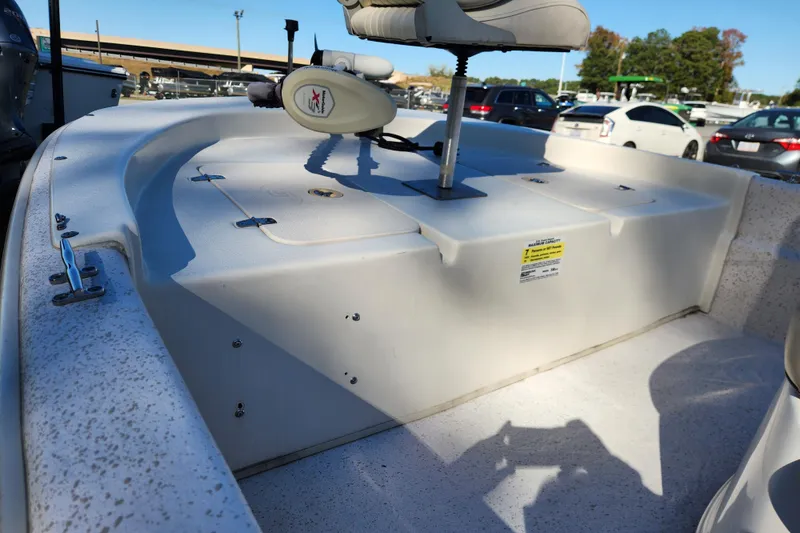 Slide: The Image of 2018 Carolina Skiff 18 JVX CC boat interior with seating and storage compartments. - 9