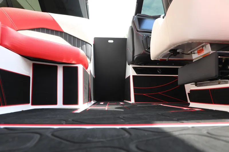 Slide: The Image of 2023 Centurion Fi25 boat interior with red and black seating and modern design. - 10