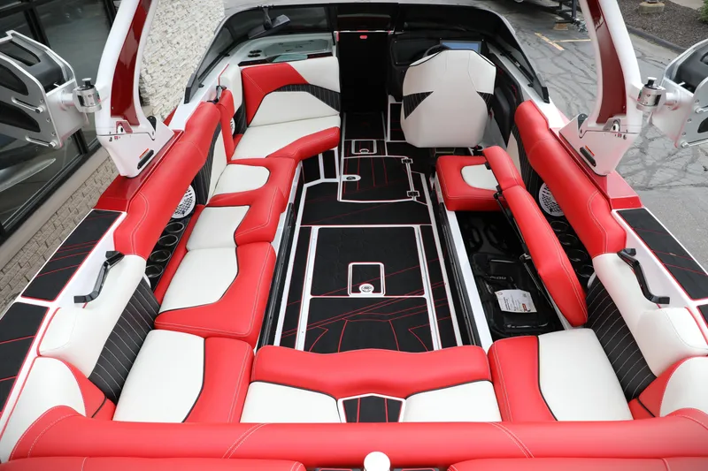 Slide: The Image of Luxurious interior of 2023 Centurion Fi25 boat with red and white seating. - 4