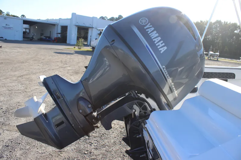 Slide: The Image of 2026 Tidewater 180 CC Adventure boat with Yamaha outboard motor in a sunny outdoor setting. - 10