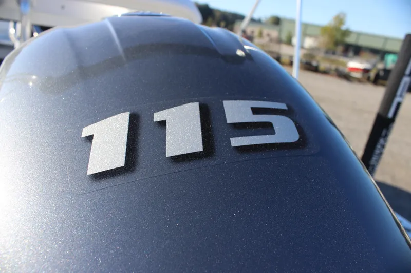 Slide: The Image of Close-up of 115 horsepower engine on 2026 Tidewater 180 CC Adventure boat. - 11