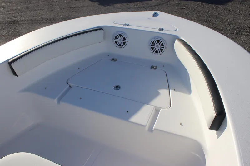 Slide: The Image of 2026 Tidewater 180 CC Adventure boat interior with seating and storage compartments. - 16