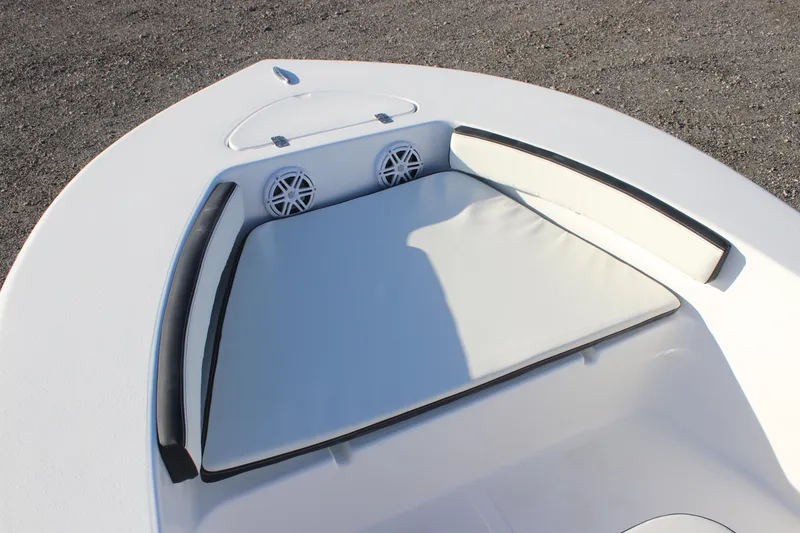 Slide: The Image of 2026 Tidewater 180 CC Adventure boat bow with cushioned seating and speakers. - 19