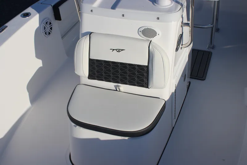 Slide: The Image of 2026 Tidewater 180 CC Adventure boat seat with sleek design and integrated speaker. - 20