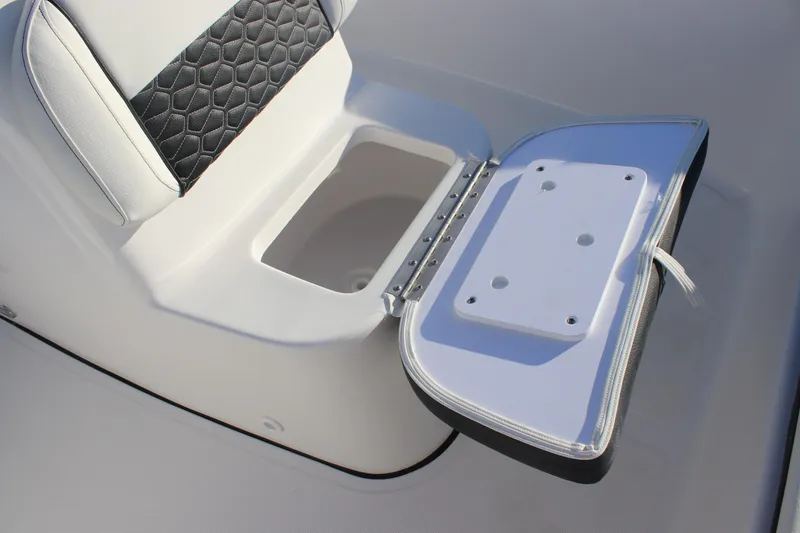 Slide: The Image of 2026 Tidewater 180 CC Adventure boat seat with open storage compartment. - 21
