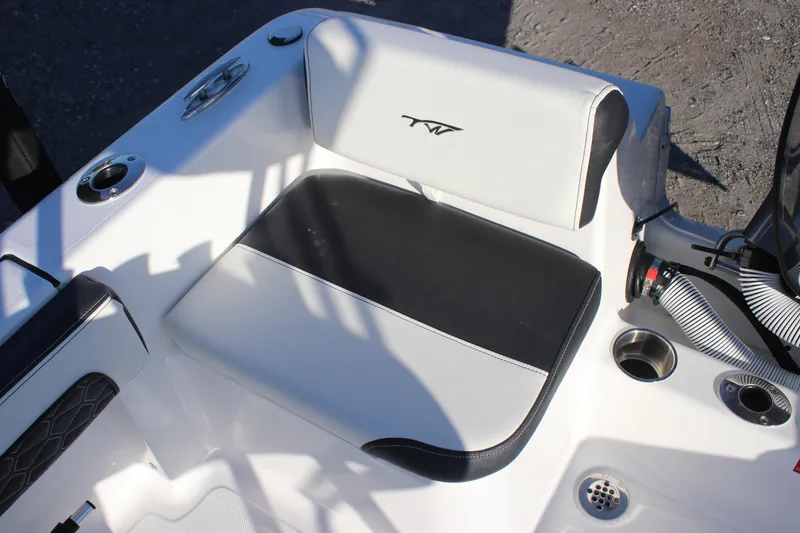 Slide: The Image of 2026 Tidewater 180 CC Adventure boat seat with black and white upholstery. - 24
