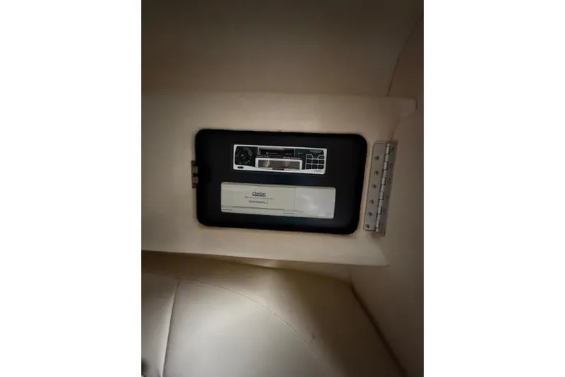 Slide: The Image of 1999 Sea Ray 270 Sundancer Special Edition cabin stereo system. - 17
