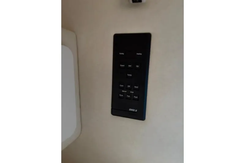 Slide: The Image of Control panel on 1999 Sea Ray 270 Sundancer Special Edition boat interior. - 18