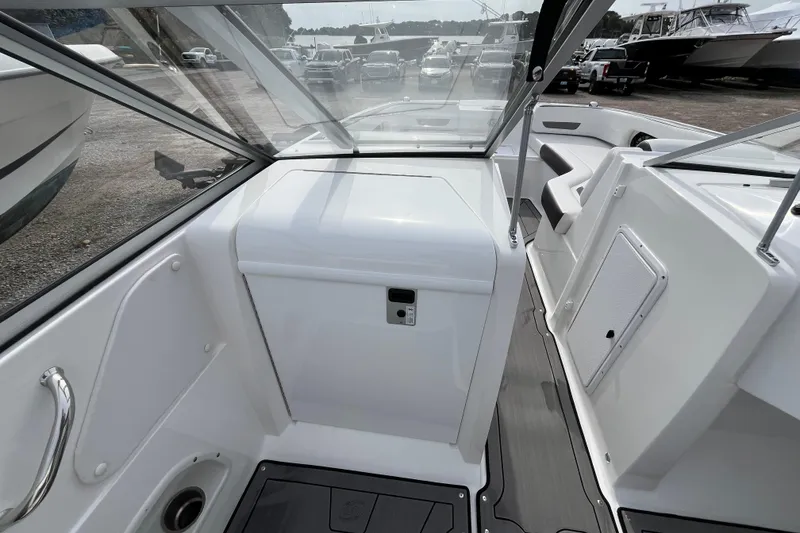 Slide: The Image of 2023 Hurricane SunDeck 235 OB interior with sleek design and modern features. - 23