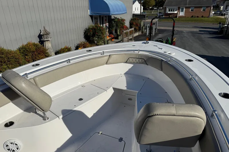 Slide: The Image of 2022 Sportsman Open 262 Center Console boat with spacious seating and sleek design. - 16