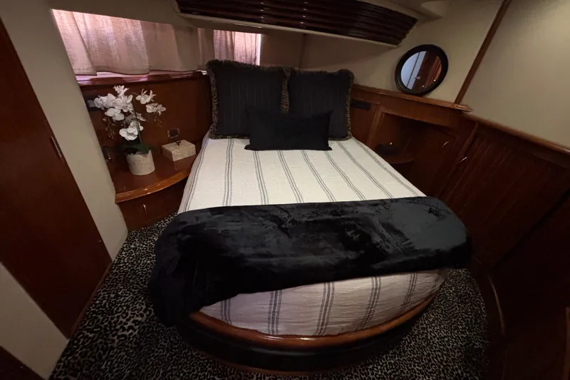 Slide: The Image of Luxurious interior of 2003 Carver 450 Voyager Pilothouse with plush seating and elegant decor. - 14