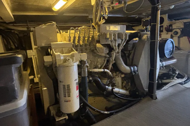 Slide: The Image of Cozy bedroom interior of 2003 Carver 450 Voyager Pilothouse with elegant bedding and TV. - 18