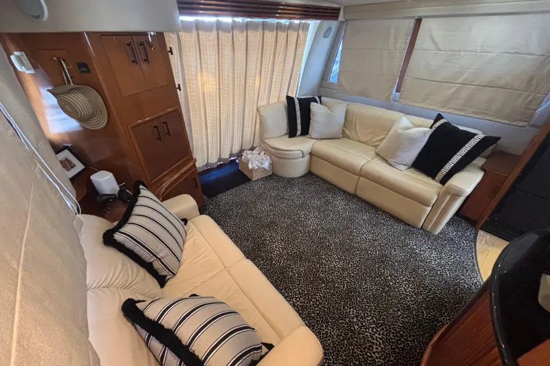 Slide: The Image of Luxurious interior of 2003 Carver 450 Voyager Pilothouse with plush seating and elegant design. - 5