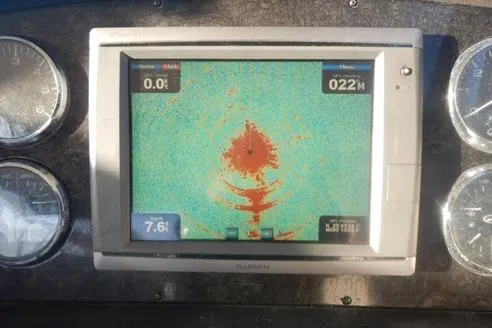 Slide: The Image of Garmin marine navigation display on 2008 Sea Ray 380 Sundancer dashboard. - 12