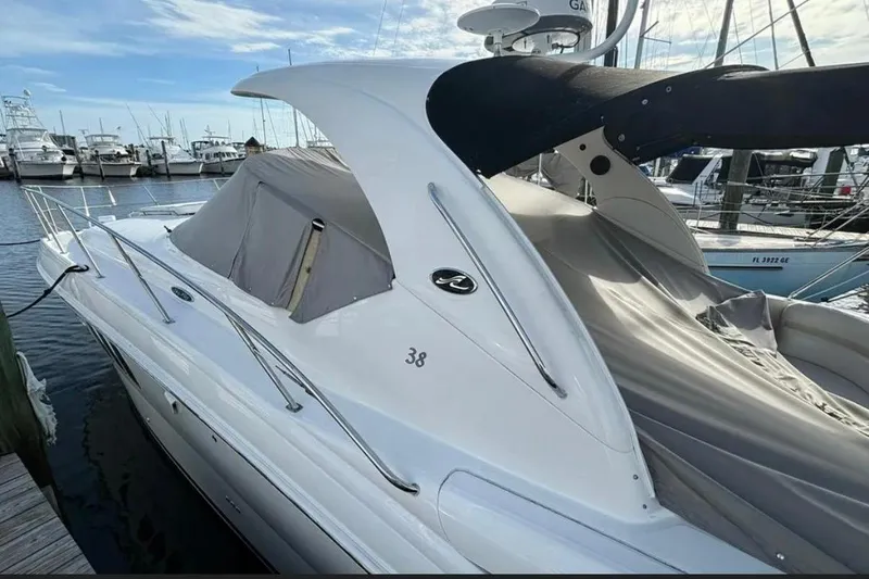 Slide: The Image of 2008 Sea Ray 38 Sundancer yacht docked at marina, covered and ready for sailing. - 3