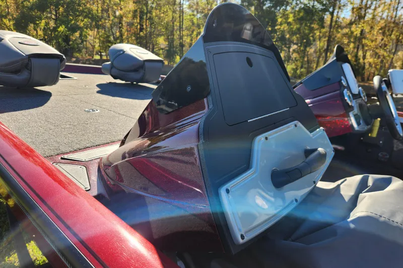 Slide: The Image of 2016 Ranger RT188 boat interior with seats and control panel, in sunlight. - 12