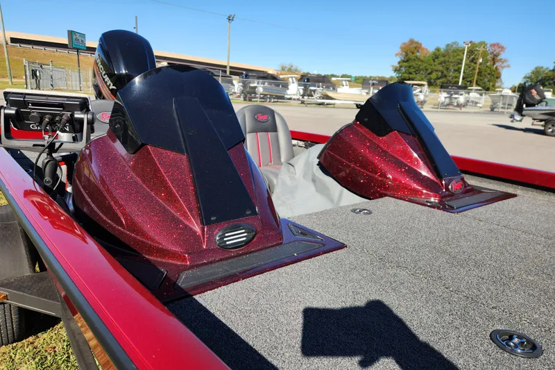 Slide: The Image of 2016 Ranger RT188 boat with red glitter finish, featuring Garmin electronics and Mercury engine. - 13