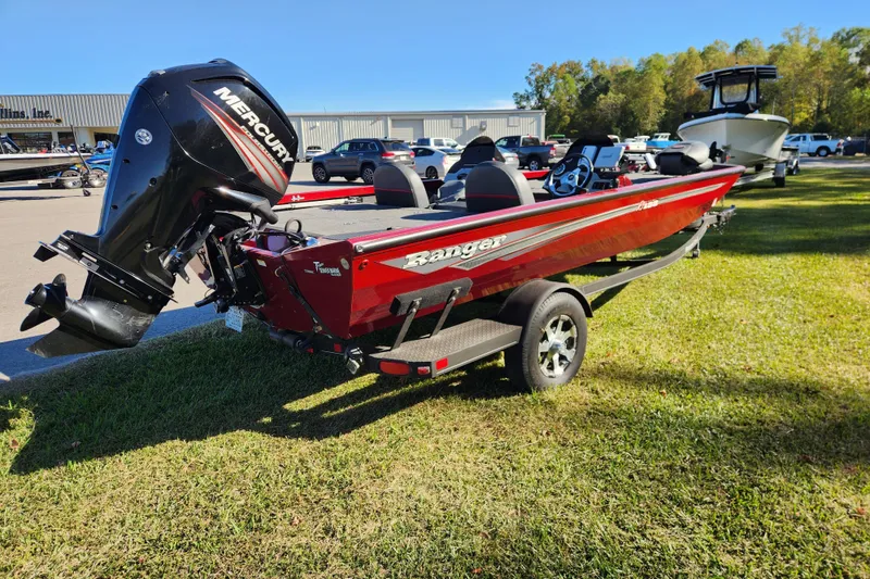 Slide: The Image of 2016 Ranger RT188 boat with Mercury engine on grassy area. - 4