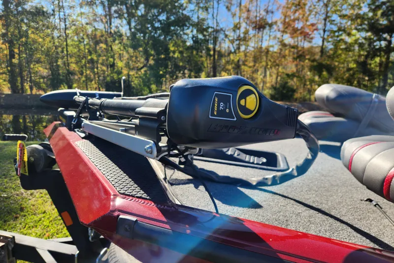 Slide: The Image of 2016 Ranger RT188 boat with trolling motor on deck, surrounded by autumn trees. - 8