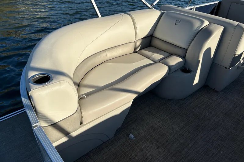 Slide: The Image of Luxurious seating on 2022 Cypress Cay Seabreeze 232 pontoon boat with cup holders. - 17