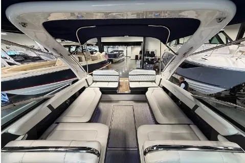 Slide: The Image of 2020 Regal 2800 Bowrider boat interior with spacious seating and modern design. - 18