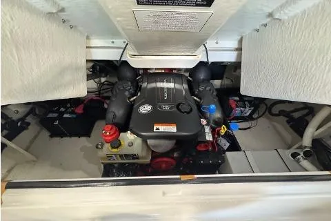 Slide: The Image of Engine compartment of 2020 Regal 2800 Bowrider boat, showcasing detailed mechanical components. - 20