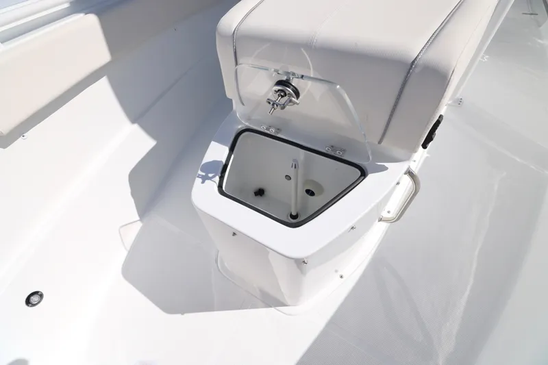 Slide: The Image of 2026 Sea Hunt Ultra 275 Coffin Box interior detail with open storage compartment. - 13
