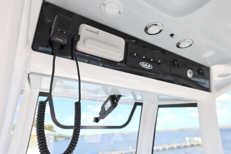 Slide: The Image of Luxury seating on 2026 Sea Hunt Ultra 275 Coffin Box boat, ocean view. - 20