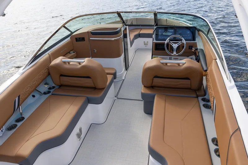 Slide: The Image of Manufacturer Provided Image: Luxurious 2026 Regal LX4 boat interior with tan leather seating and modern dashboard. - 8