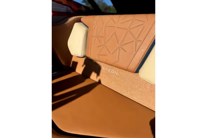 Slide: The Image of 2021 Nautique Super Air Nautique G23 Paragon seat with luxurious tan upholstery. - 10