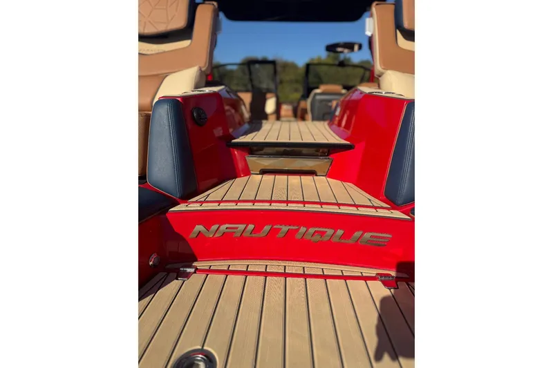 Slide: The Image of 2021 Nautique Super Air Nautique G23 Paragon interior detail with logo and seating. - 15