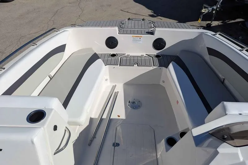 Slide: The Image of 2026 Starcraft SVX 171 OB boat interior with seating and storage compartments. - 11