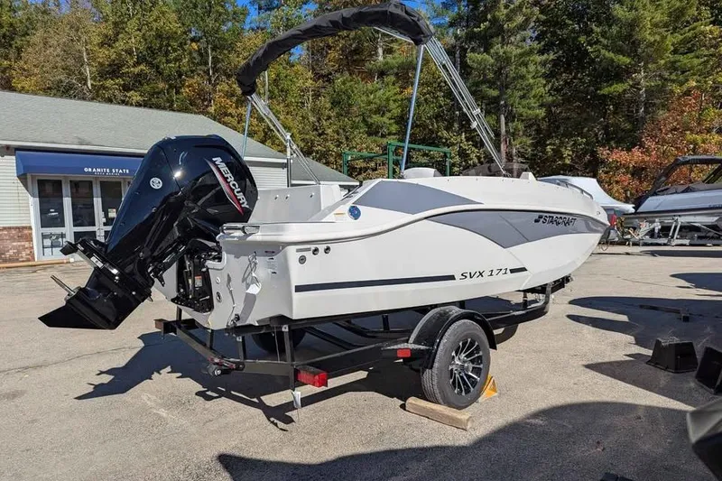 Slide: The Image of 2026 Starcraft SVX 171 OB boat on trailer, featuring Mercury outboard motor. - 4