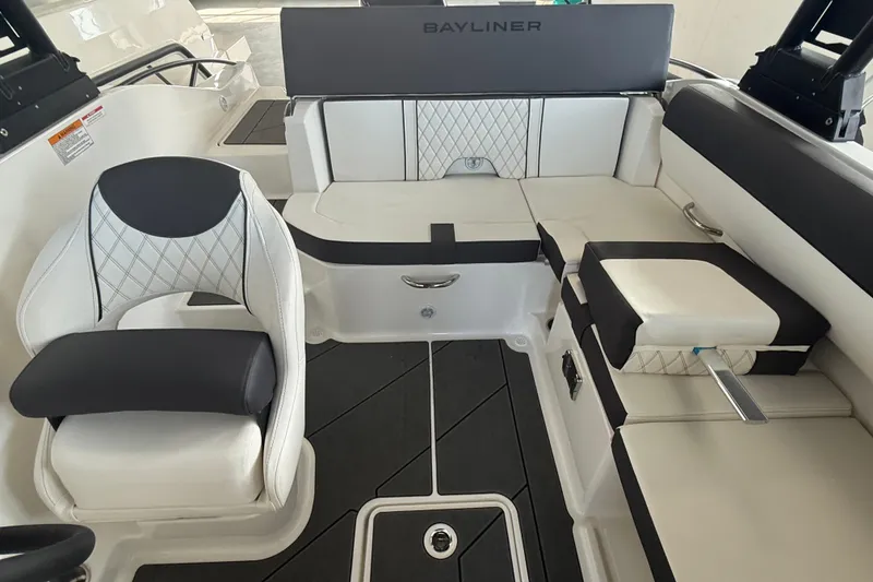 Slide: The Image of Luxurious interior of 2026 Bayliner D20 boat with stylish seating and modern design. - 12