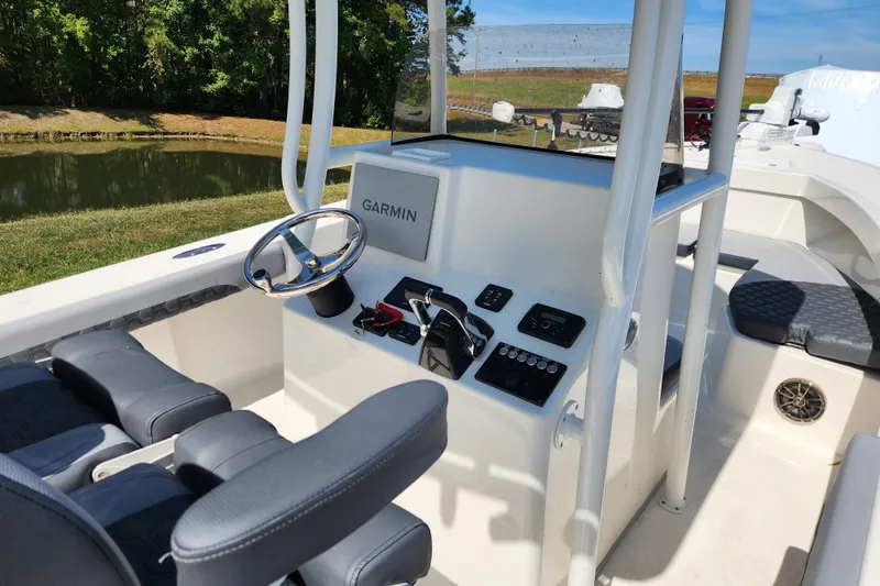Slide: The Image of 2025 May-Craft 245 Offshore CC boat console with Garmin navigation system. - 12