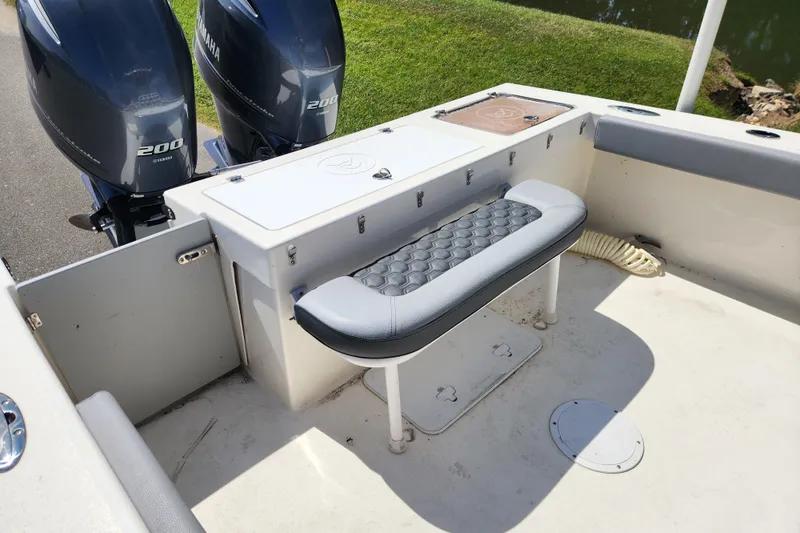 Slide: The Image of 2025 May-Craft 245 Offshore CC boat with Yamaha 200 engines and cushioned seating. - 15